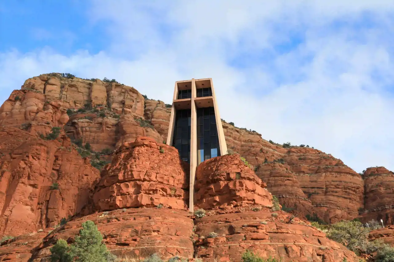 The Chapel of the Holy Cross is a Roman Catholic chapel built from 1954 to 1956 into the red rock buttes of Sedona, Arizona, within the Coconino National Forest.